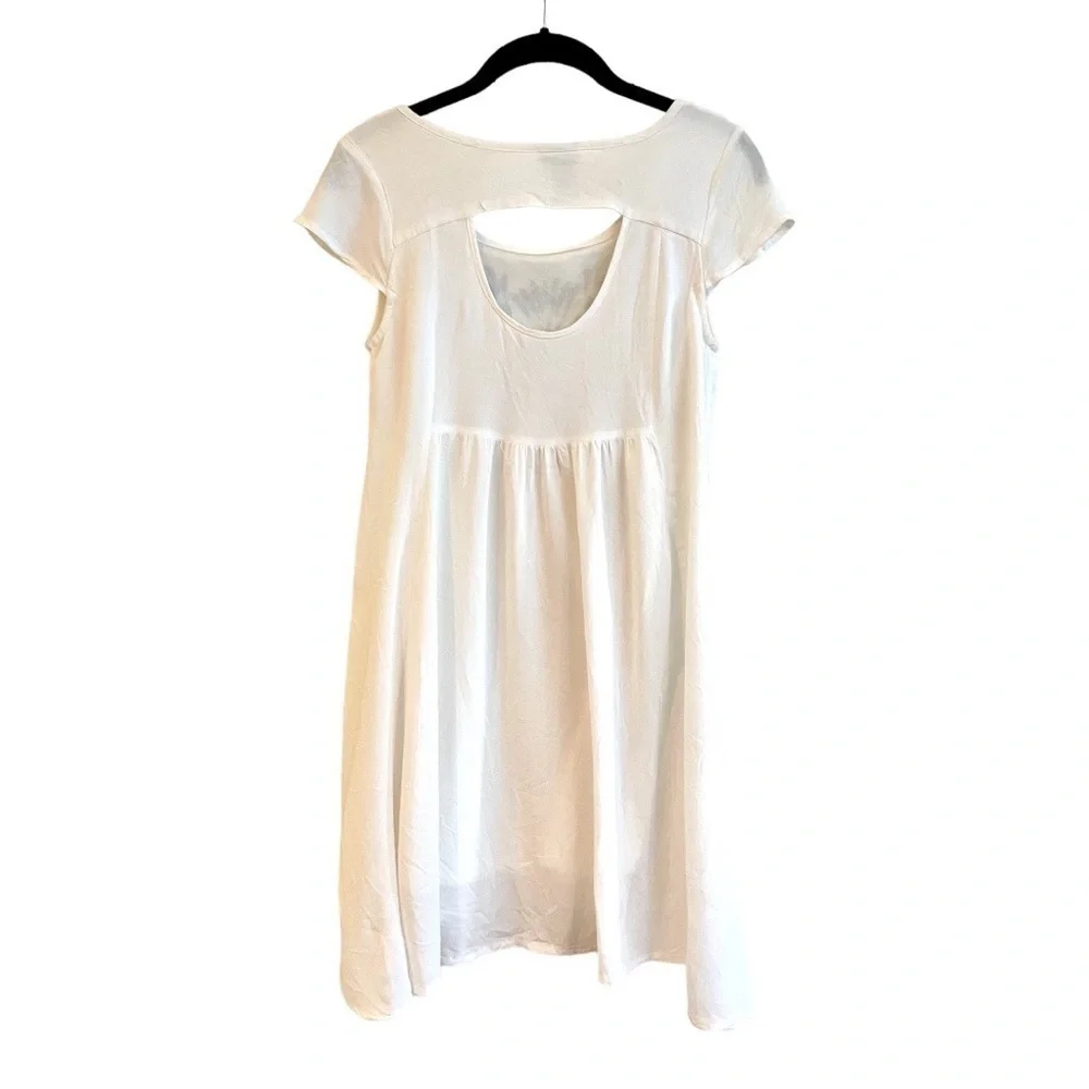 RUE 21, WHITE EMPIRE DRESS WITH BLACK EMBROIDERY. HI-LOW SKIRT. SIZE S